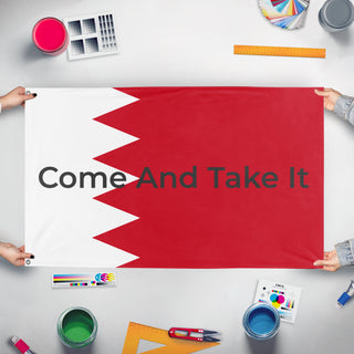 A mockup of the custom flag 'test 4 flag' held up on a table during print checking