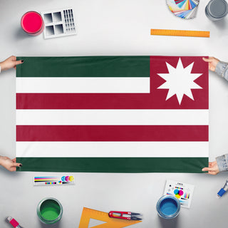 A mockup of the custom flag 'KAMIWORLD flag' held up on a table during print checking