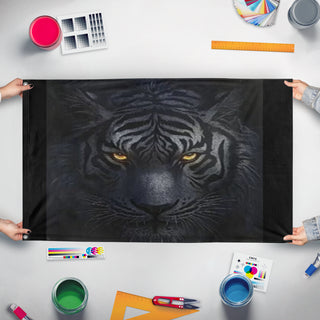 A mockup of the custom flag 'TU-Tiger flag' held up on a table during print checking