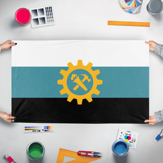 A mockup of the custom flag 'United Syndicalist Republic of Appalachia/U.S.R.A. flag' held up on a table during print checking