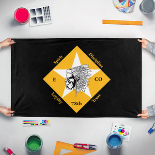 A mockup of the custom flag 'Flag' held up on a table during print checking