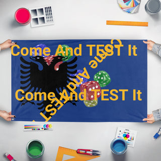 A mockup of the custom flag 'T flag' held up on a table during print checking