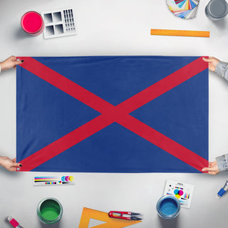 A mockup of the custom flag 'scotiland flag' held up on a table during print checking