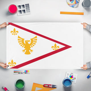 A mockup of the custom flag 'MABISKA FLAG' held up on a table during print checking