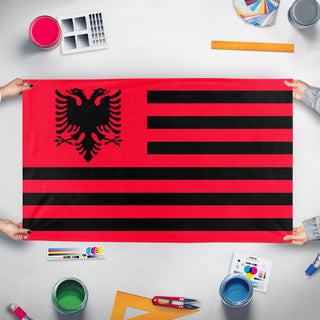 A mockup of the custom flag 'Albanian Heritage Flag' held up on a table during print checking