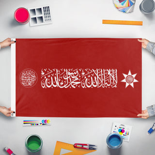 A mockup of the custom flag 'Hashemites Royal Family flag' held up on a table during print checking
