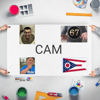 A mockup of the custom flag 'Cam Republic flag' held up on a table during print checking