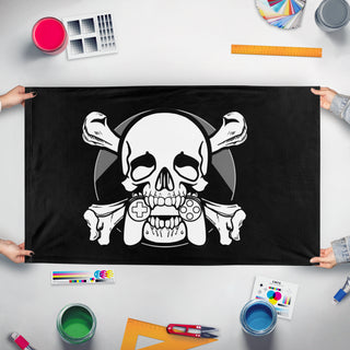 A mockup of the custom flag 'Mutineers flag' held up on a table during print checking