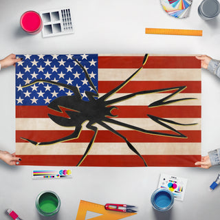 A mockup of the custom flag 'MCR Danger Days Spider flag' held up on a table during print checking