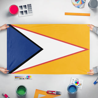 A mockup of the custom flag 'MIUE flag' held up on a table during print checking