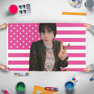 A mockup of the custom flag 'Hammy flag' held up on a table during print checking