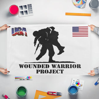 A mockup of the custom flag 'Wounded Warrior flag' held up on a table during print checking