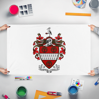 A mockup of the custom flag 'CS Family Flag' held up on a table during print checking