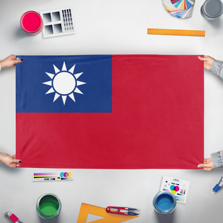 A mockup of the custom flag 'Republic Of China' held up on a table during print checking