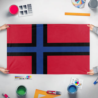 A mockup of the custom flag 'Zalinesia flag' held up on a table during print checking