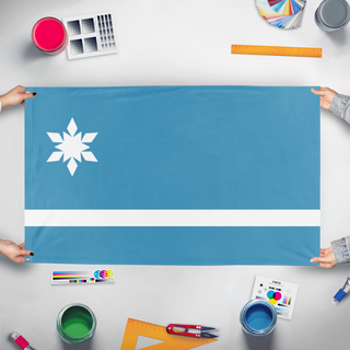 A mockup of the custom flag 'Aurelia flag' held up on a table during print checking