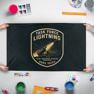 A mockup of the custom flag 'TFL HOR flag' held up on a table during print checking