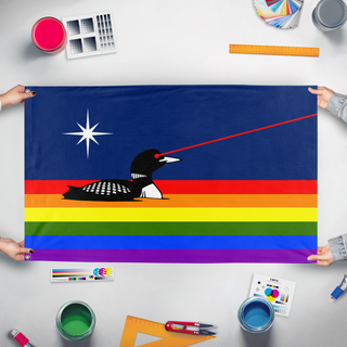 A mockup of the custom flag 'Laser Loon Pride flag' held up on a table during print checking