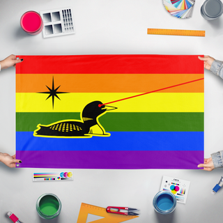 A mockup of the custom flag 'Minnesota Laser Loon Pride flag' held up on a table during print checking