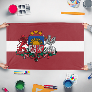A mockup of the custom flag 'Latvian Coat of Arms Flag' held up on a table during print checking