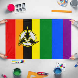 A mockup of the custom flag 'Klingon Empire Pride flag' held up on a table during print checking