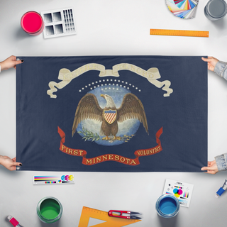 A mockup of the custom flag 'First MN Volunrs flag' held up on a table during print checking