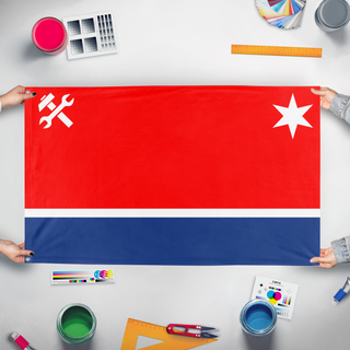 A mockup of the custom flag 'November flag' held up on a table during print checking