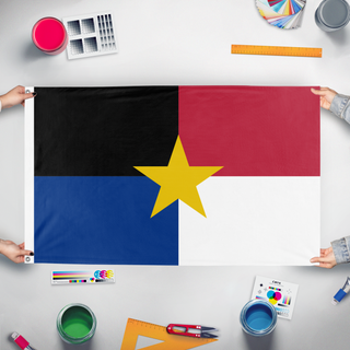 A mockup of the custom flag 'La Mancha flag' held up on a table during print checking
