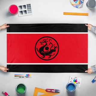 A mockup of the custom flag 'Han Nationalist flag' held up on a table during print checking