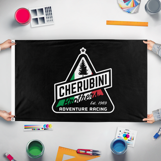 A mockup of the custom flag 'Cherubini-racing-black flag' held up on a table during print checking
