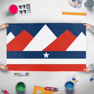 A mockup of the custom flag 'Alberta Republic flag' held up on a table during print checking