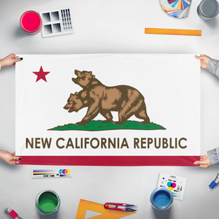 A mockup of the custom flag 'ncr_flag' held up on a table during print checking