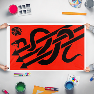 A mockup of the custom flag 'Libertarian Socialist flag' held up on a table during print checking