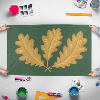 A mockup of the custom flag 'Ranger flag' held up on a table during print checking