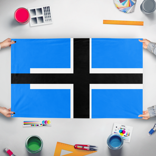 A mockup of the custom flag 'yui flag' held up on a table during print checking