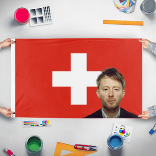 A mockup of the custom flag 'thom yorke swiss  flag' held up on a table during print checking