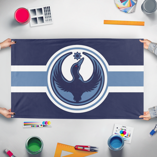 A mockup of the custom flag 'MN_LOON flag' held up on a table during print checking
