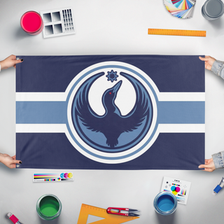 A mockup of the custom flag 'MN_LOON flag' held up on a table during print checking