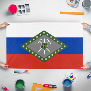 A mockup of the custom flag '42nd Separate Mountaineering Rifle Brigade flag' held up on a table during print checking