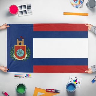 A mockup of the custom flag 'Erandian Flag' held up on a table during print checking