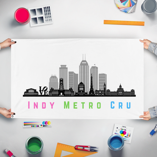 A mockup of the custom flag 'Indy Metro Cru flag' held up on a table during print checking