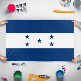 A mockup of the custom flag 'Old Honduras flag' held up on a table during print checking