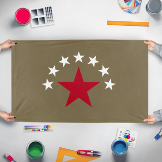 A mockup of the custom flag 'The Seven and One flag' held up on a table during print checking