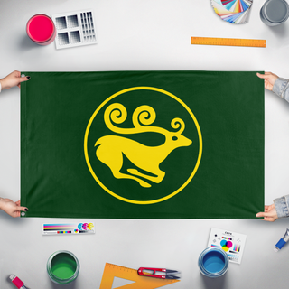A mockup of the custom flag 'Scythia flag' held up on a table during print checking