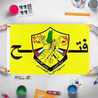 A mockup of the custom flag 'FATAH flag' held up on a table during print checking