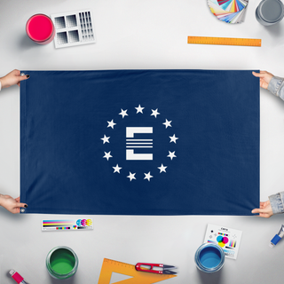 A mockup of the custom flag 'Enclave flag' held up on a table during print checking