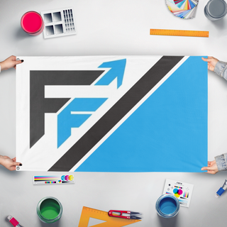 A mockup of the custom flag 'Fremont Flight flag' held up on a table during print checking