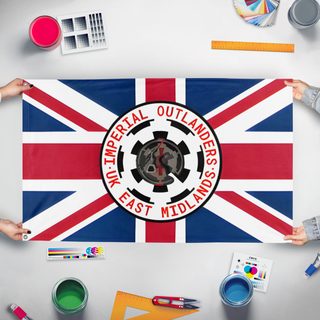 A mockup of the custom flag 'group flag' held up on a table during print checking