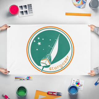 A mockup of the custom flag 'Stargazer flag' held up on a table during print checking