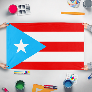A mockup of the custom flag 'Pro-Independence Peurto Rico flag' held up on a table during print checking